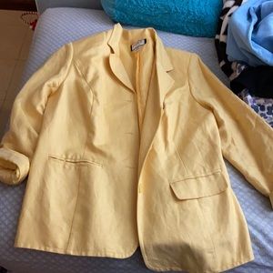 Yellow blazer with shoulder pads and three buttons